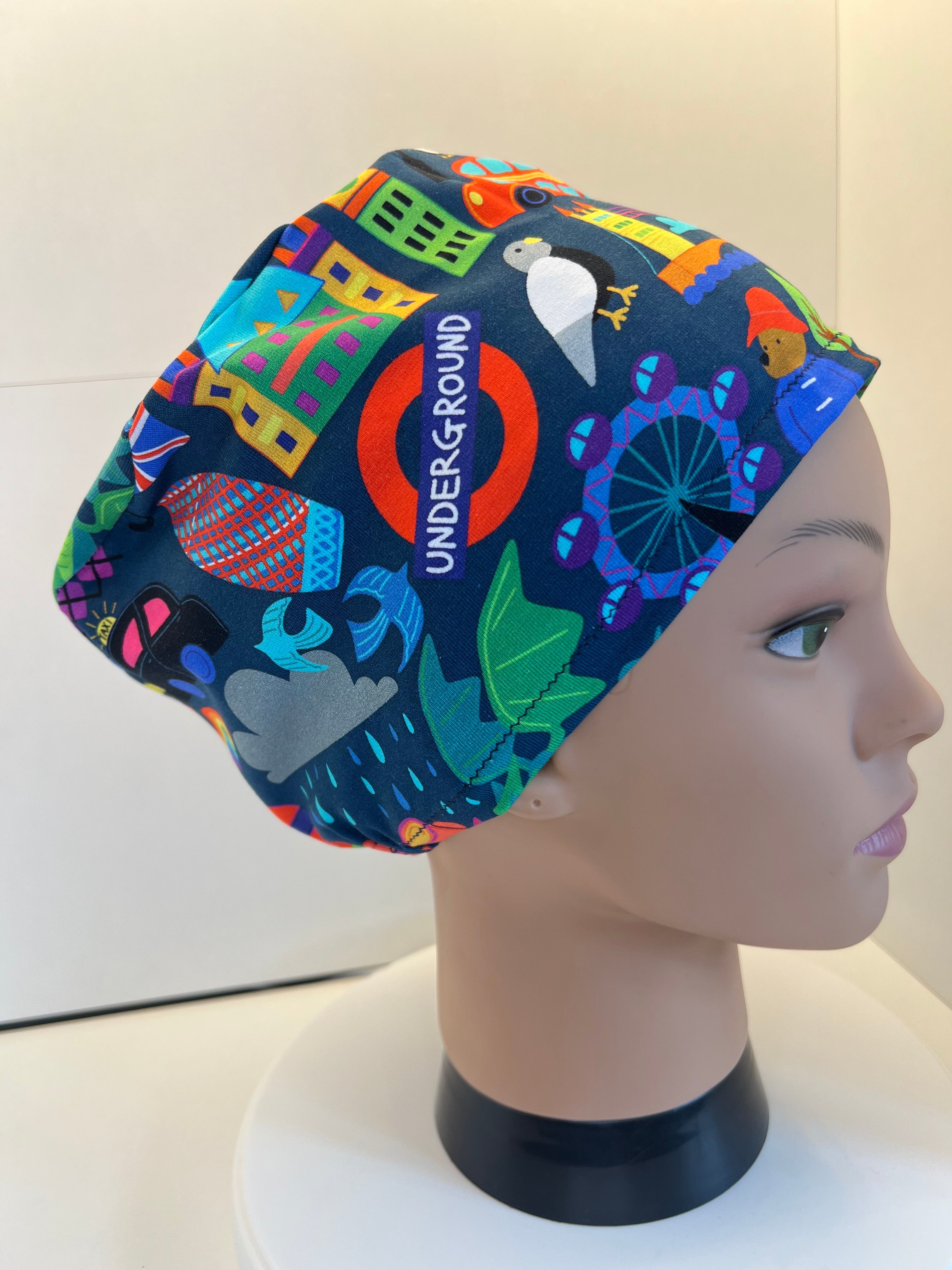 London themed Navy Soft Jersey Fabric theatre scrub cap / hat.  Ethically made. Standard and Large size