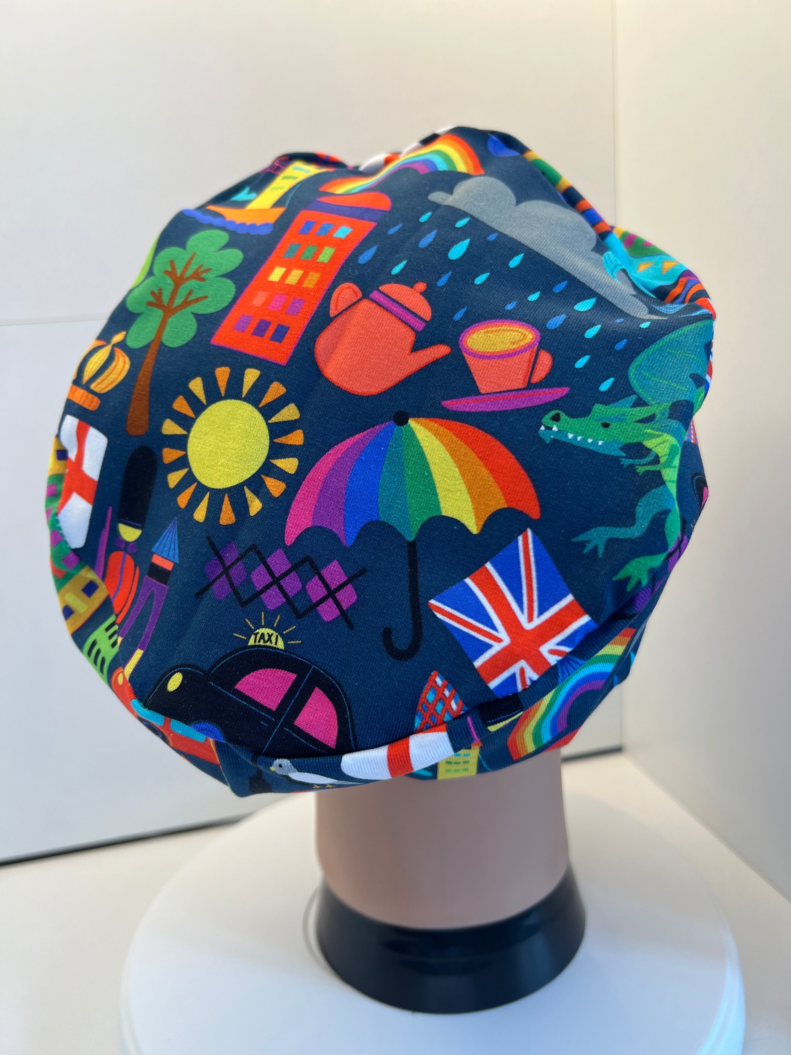 London themed Navy Soft Jersey Fabric theatre scrub cap / hat.  Ethically made. Standard and Large size