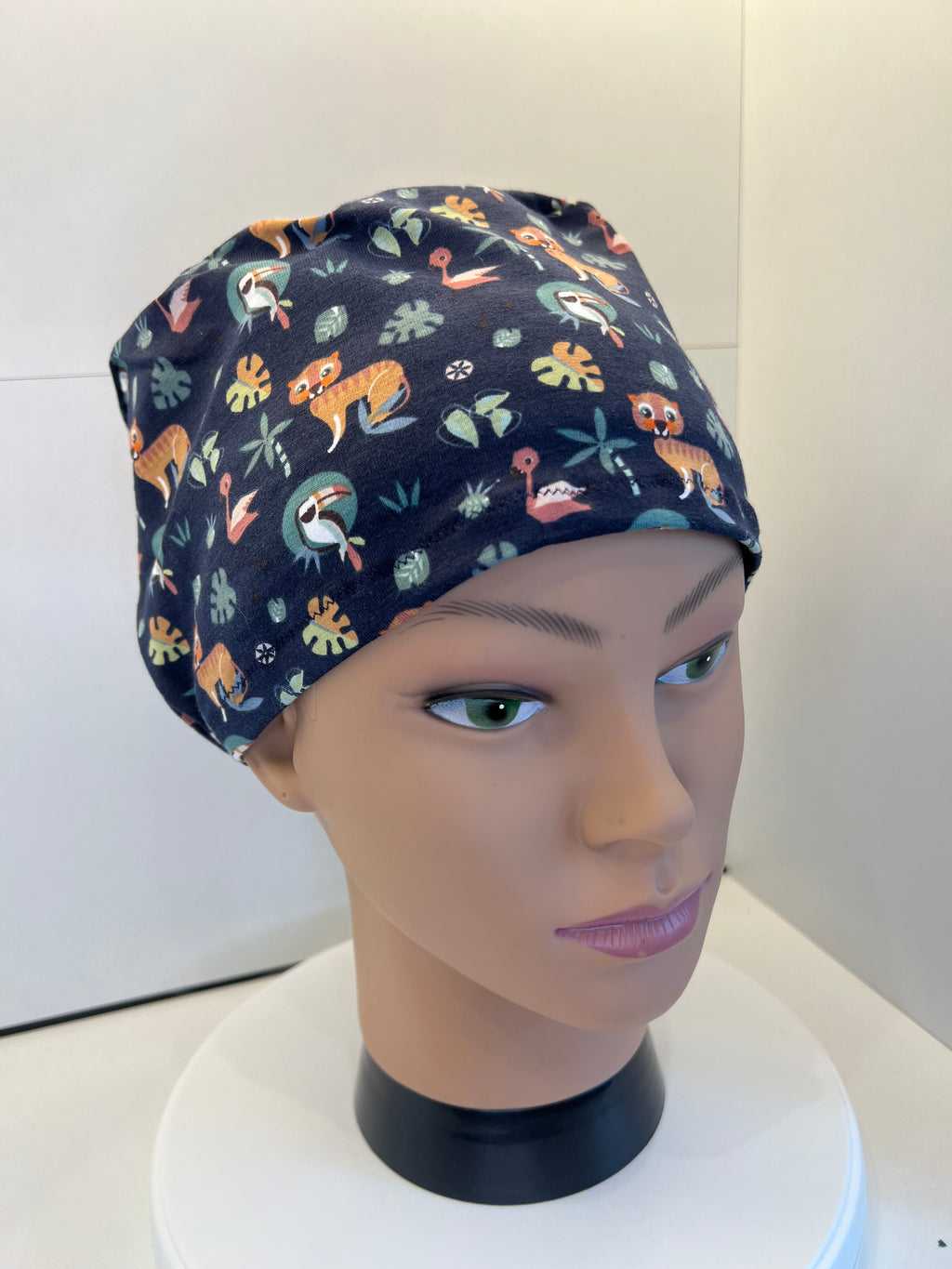 Navy Jungle Animals Soft Jersey Fabric theatre scrub cap / hat.  Ethically made. Standard and Large size