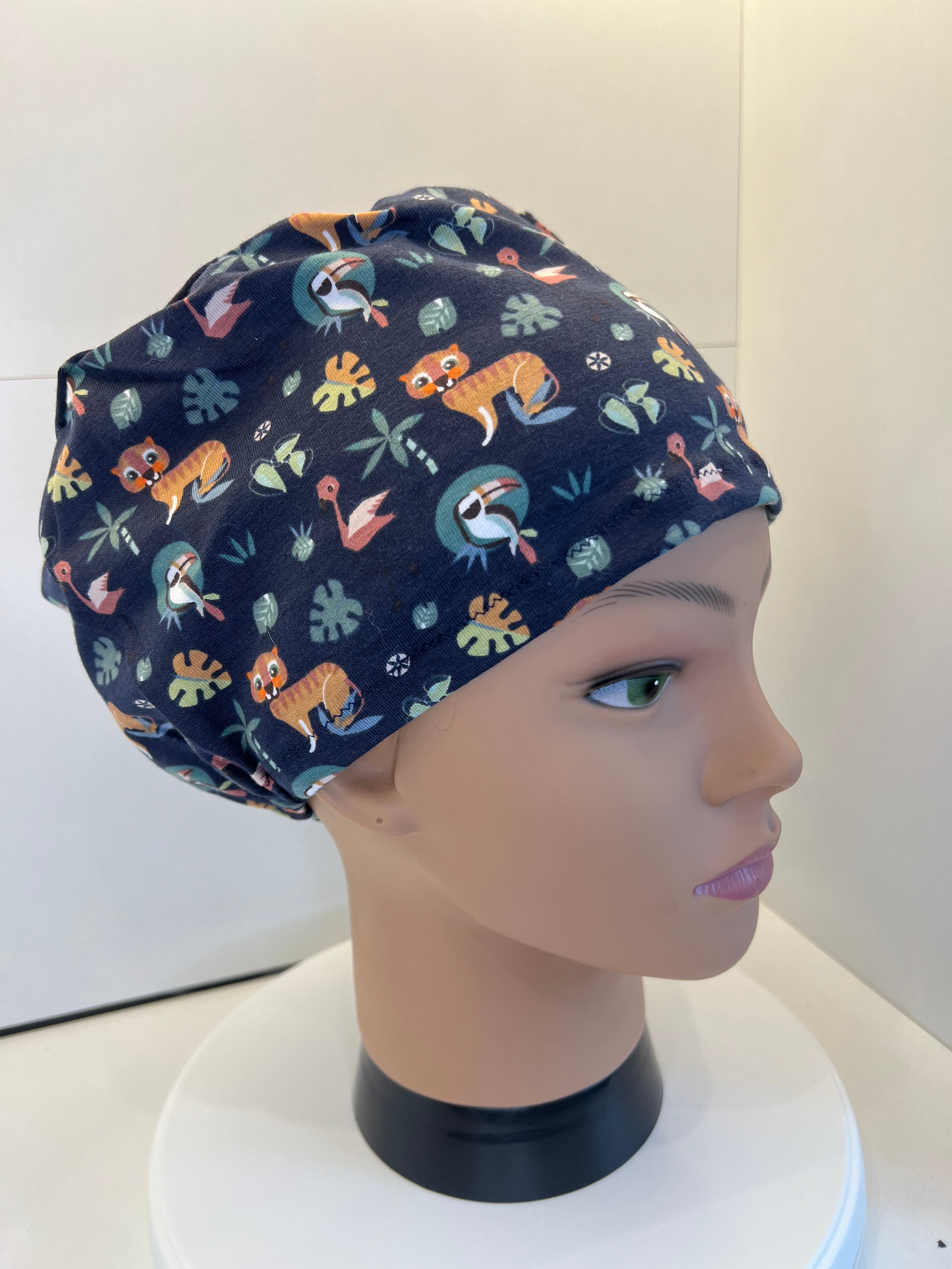 Navy Jungle Animals Soft Jersey Fabric theatre scrub cap / hat.  Ethically made. Standard and Large size