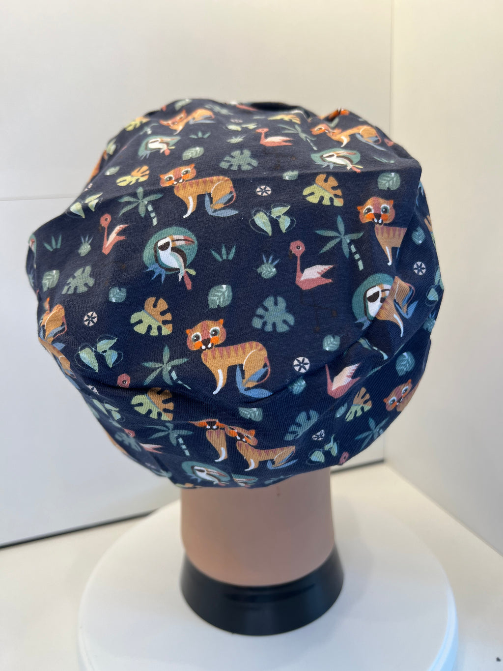 Navy Jungle Animals Soft Jersey Fabric theatre scrub cap / hat.  Ethically made. Standard and Large size