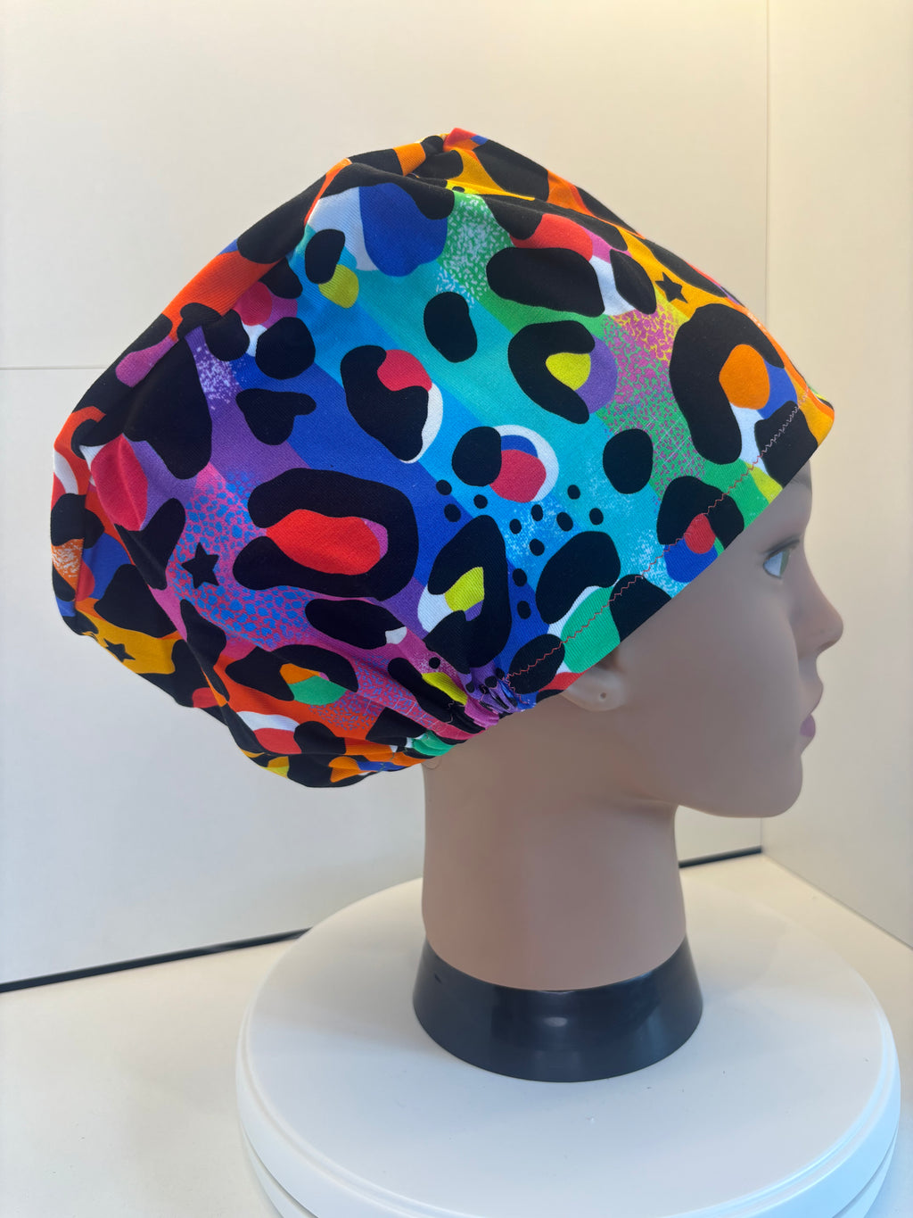 Rainbow Leopard Print Soft Jersey Fabric theatre scrub cap / hat.  Ethically made. Standard and Large size