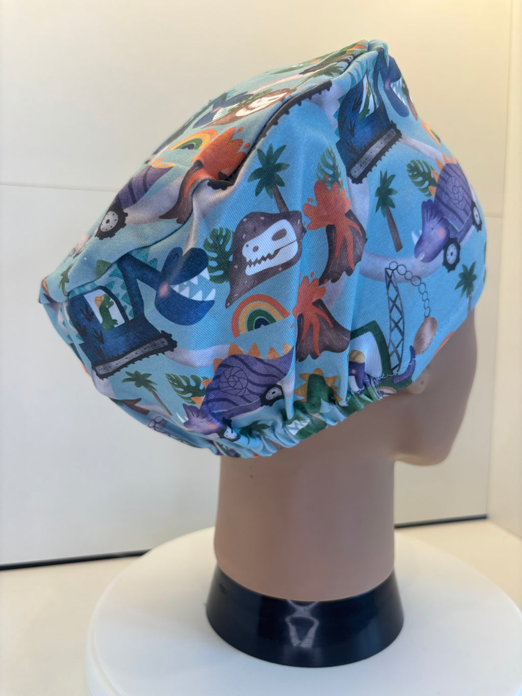 Dino Trucks Premium Jersey super soft and smooth cotton theatre scrub hat/cap.
