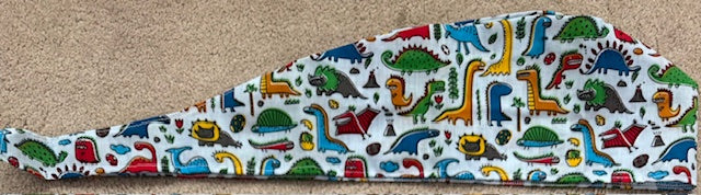 Fun Dinosaurs Cotton Fabric tie-back theatre scrub cap / hat.  Ethically made