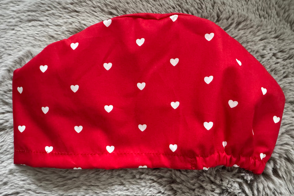 Red and White Heart design Satin-lined fabric theatre scrub cap / hat.  Ethically made.