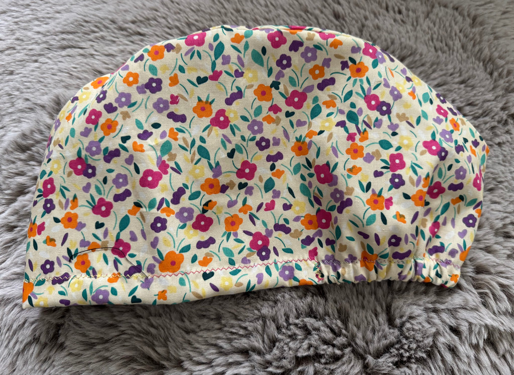Lemon multi-floral Satin-lined fabric theatre scrub cap / hat.  Ethically made.