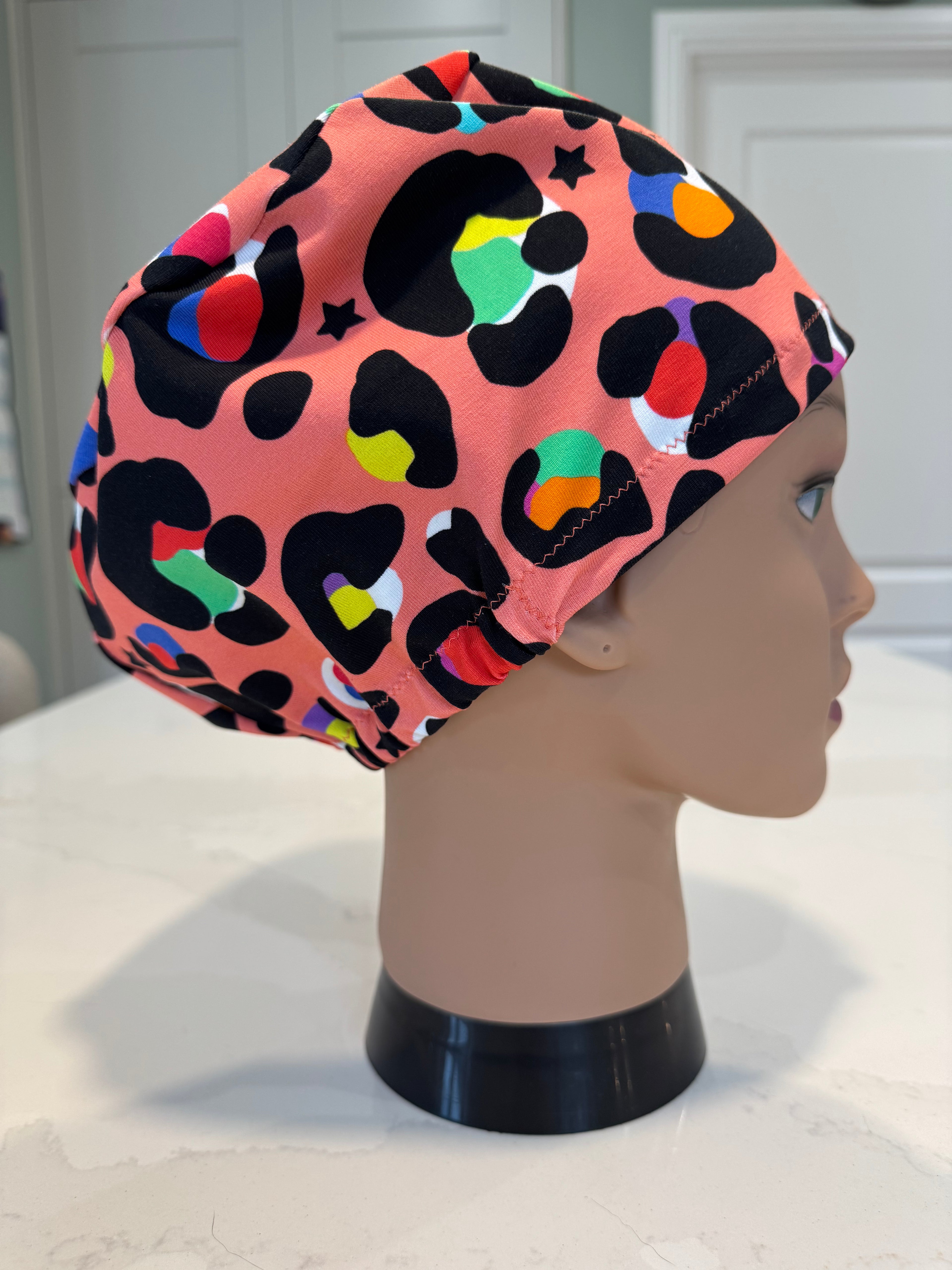 Coral Leopard Print Soft Jersey Fabric theatre scrub cap / hat.  Ethically made. Standard and Large size