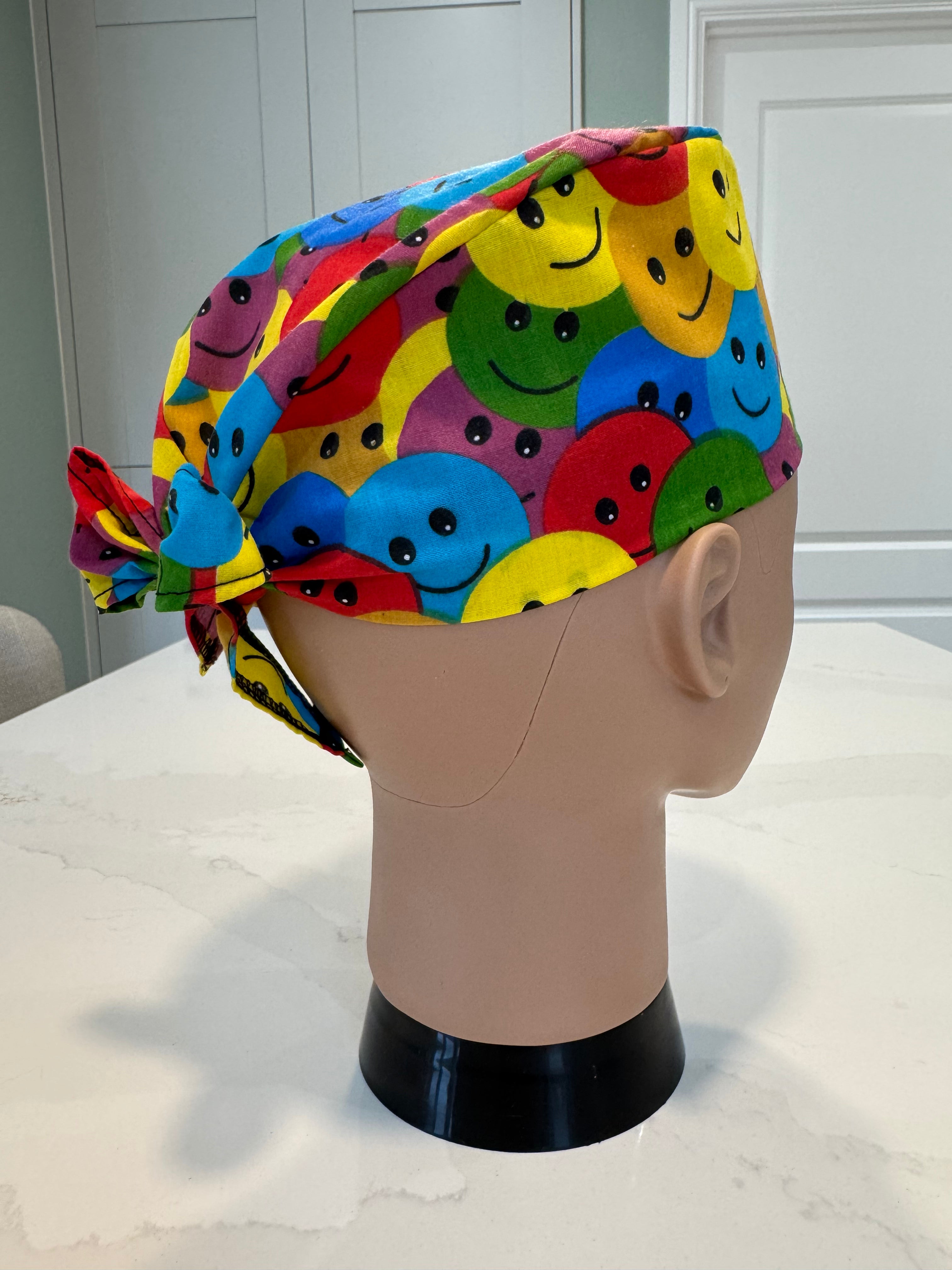 Happy Smiles design Cotton Fabric tie-back theatre scrub cap / hat.  Ethically made.