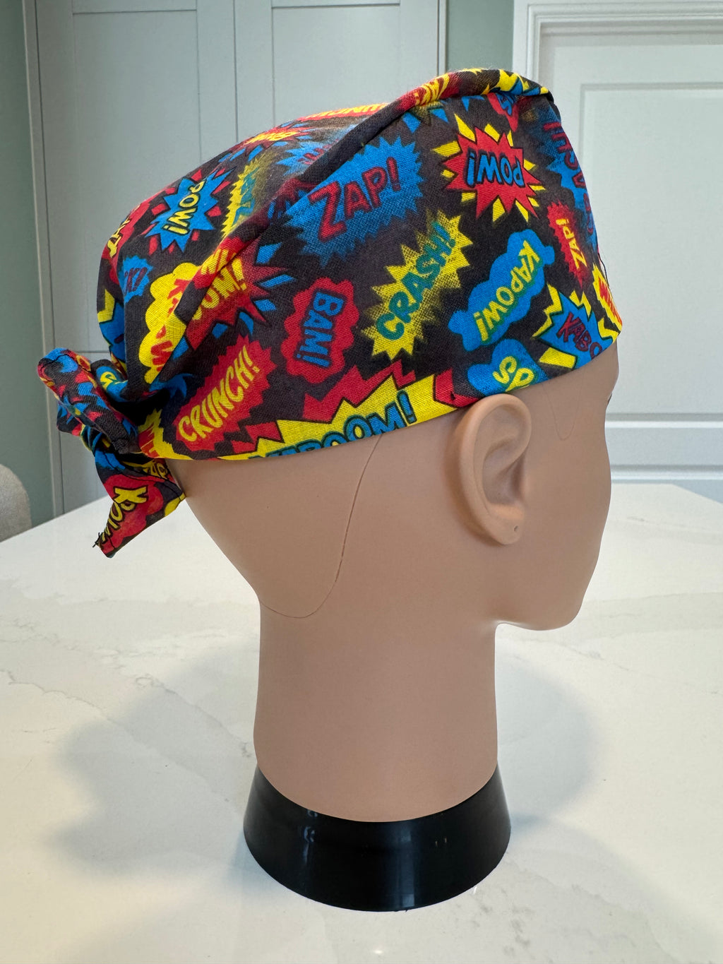 WHAM! POW! Superhero design Cotton Fabric tie-back theatre scrub cap / hat.  Ethically made.