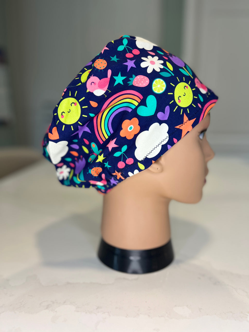 Navy Sunny Skies Soft Jersey Fabric theatre scrub cap / hat.  Ethically made. Standard and Large size