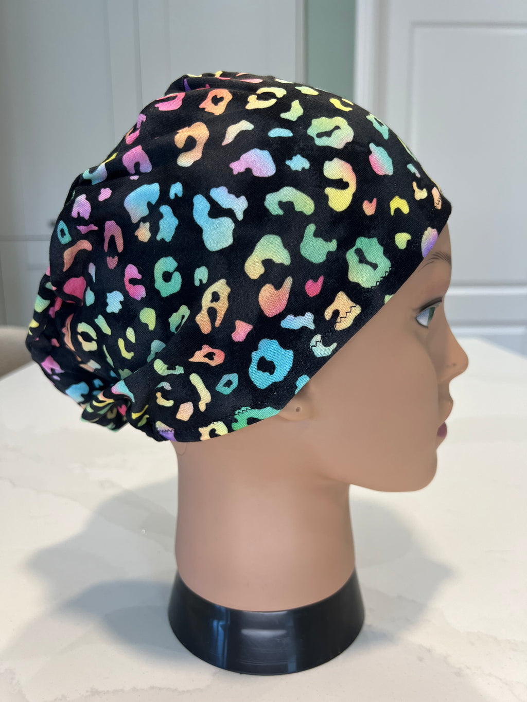 Black rainbow leopard print design Soft Bamboo Jersey Fabric theatre scrub cap / hat.  Ethically made.