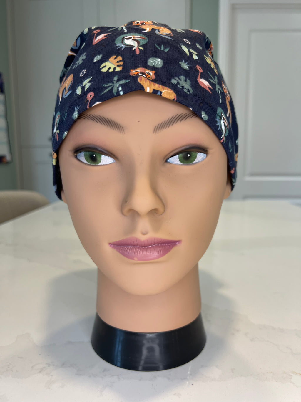 Navy Jungle Animals Soft Jersey Fabric theatre scrub cap / hat.  Ethically made. Standard and Large size