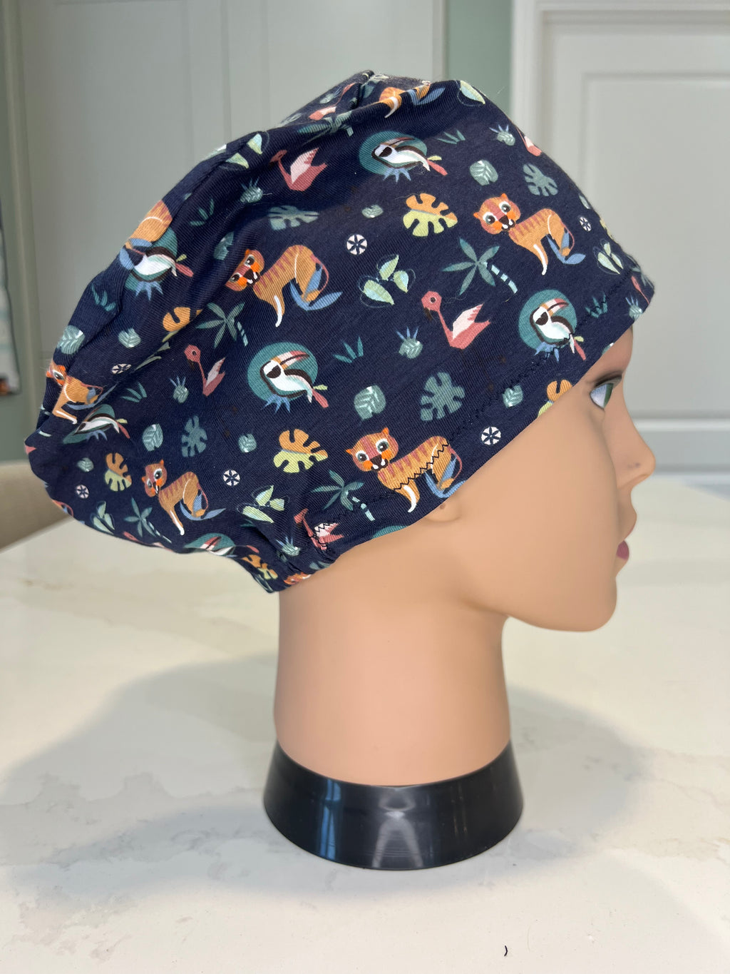 Navy Jungle Animals Soft Jersey Fabric theatre scrub cap / hat.  Ethically made. Standard and Large size