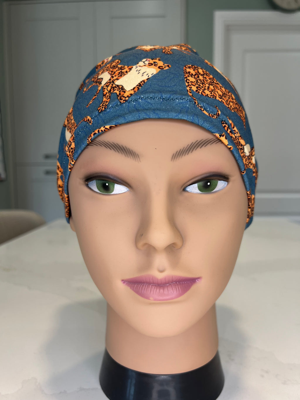 Teal Jumping Leopards Soft Jersey Fabric theatre scrub cap / hat.  Ethically made. Standard and Large size