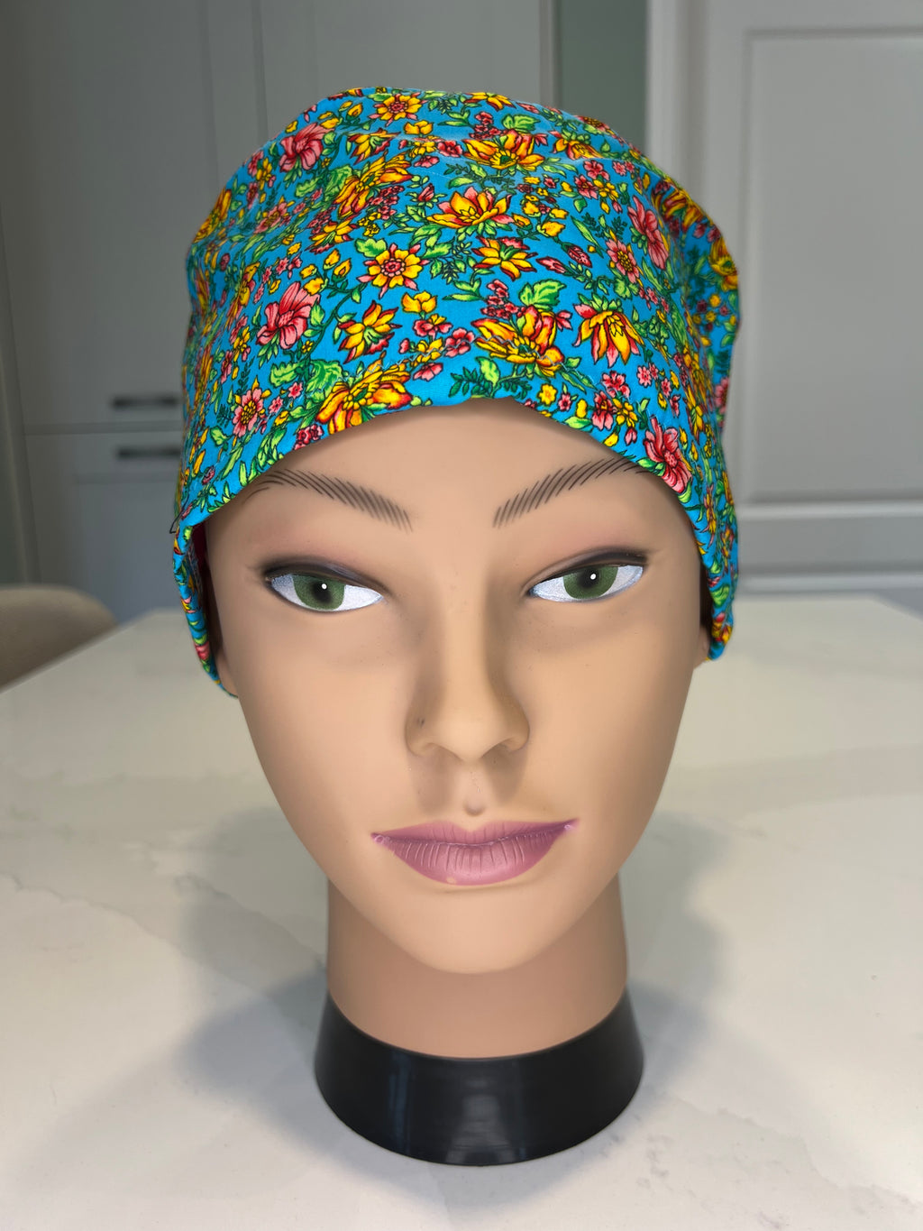 Vibrant Turquoise Floral design Satin-lined fabric theatre scrub cap / hat.  Ethically made.