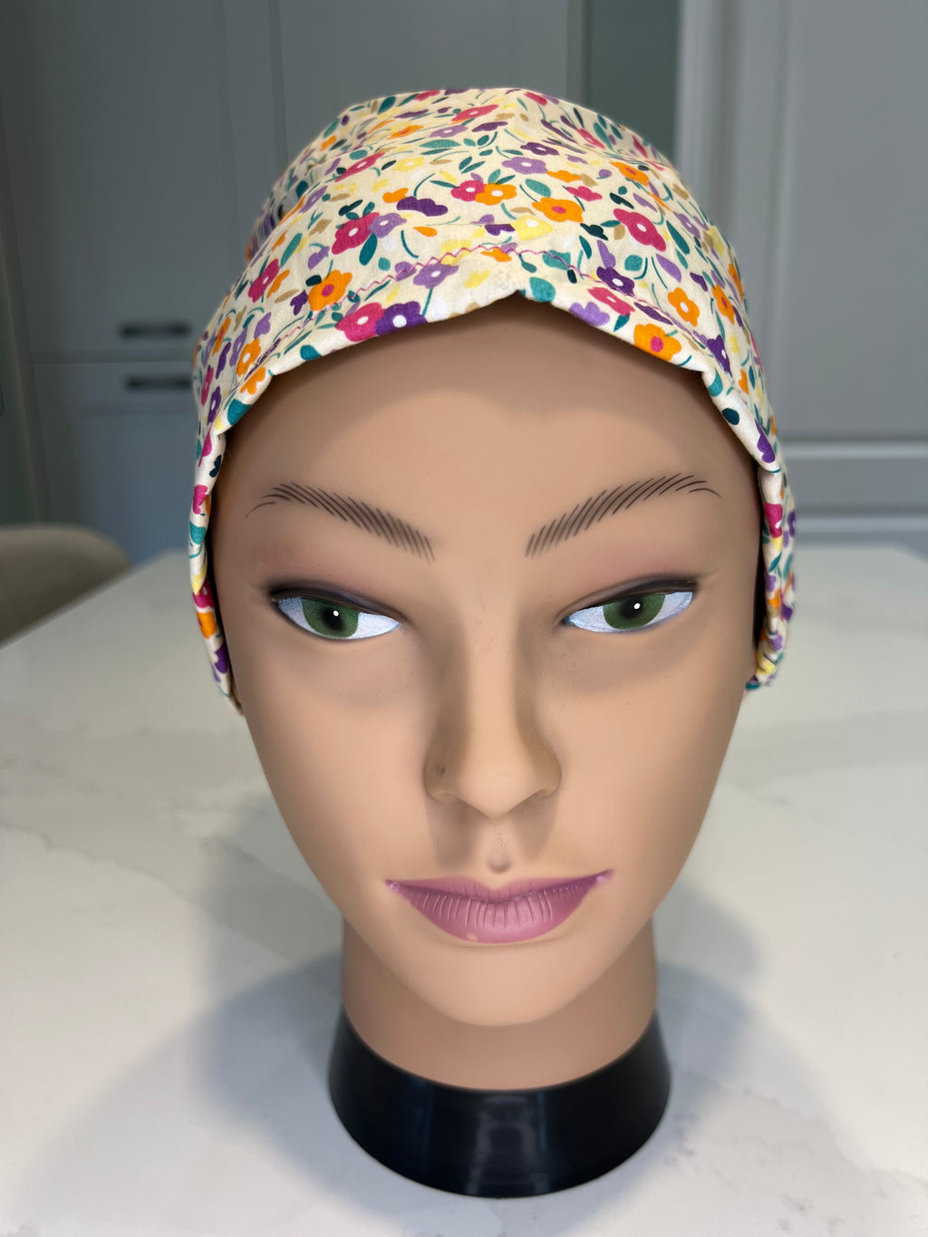 Lemon multi-floral Satin-lined fabric theatre scrub cap / hat.  Ethically made.