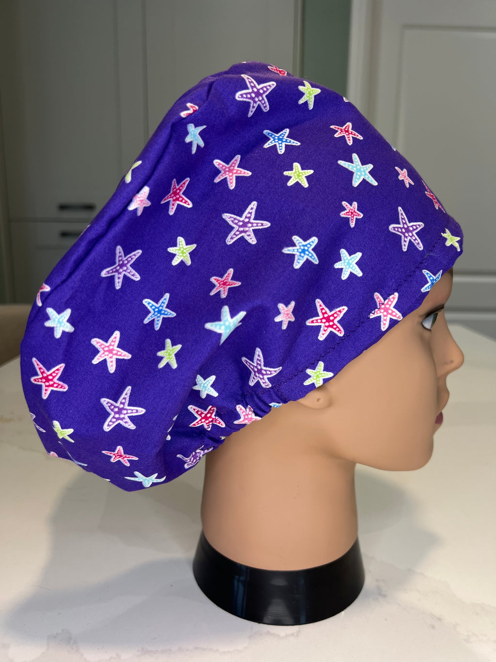 Purple Starfish Satin-lined fabric theatre scrub cap / hat.  Ethically made.
