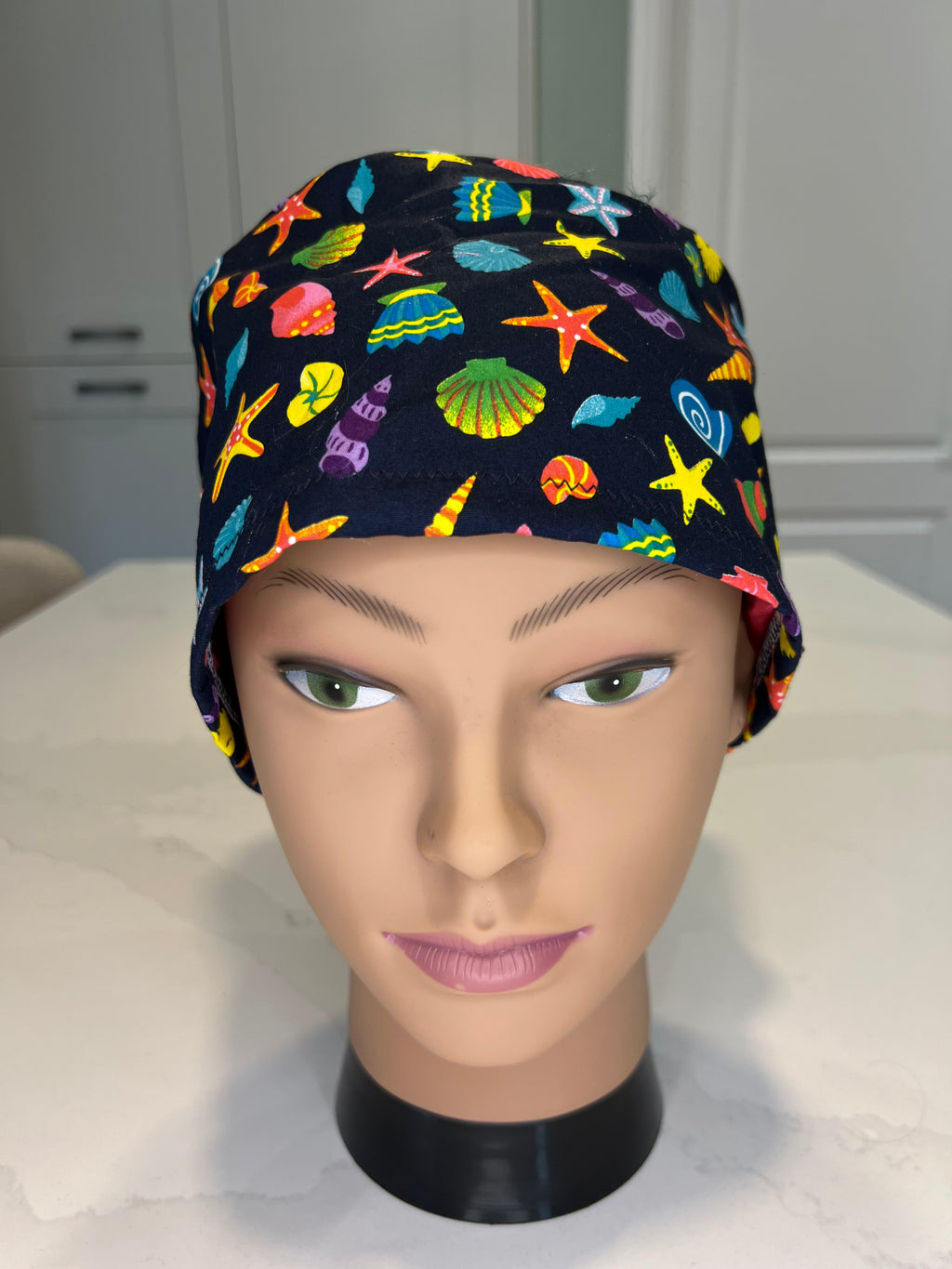 Navy Seashells Satin-lined Cotton theatre scrub hat / cap.  Ethically made.