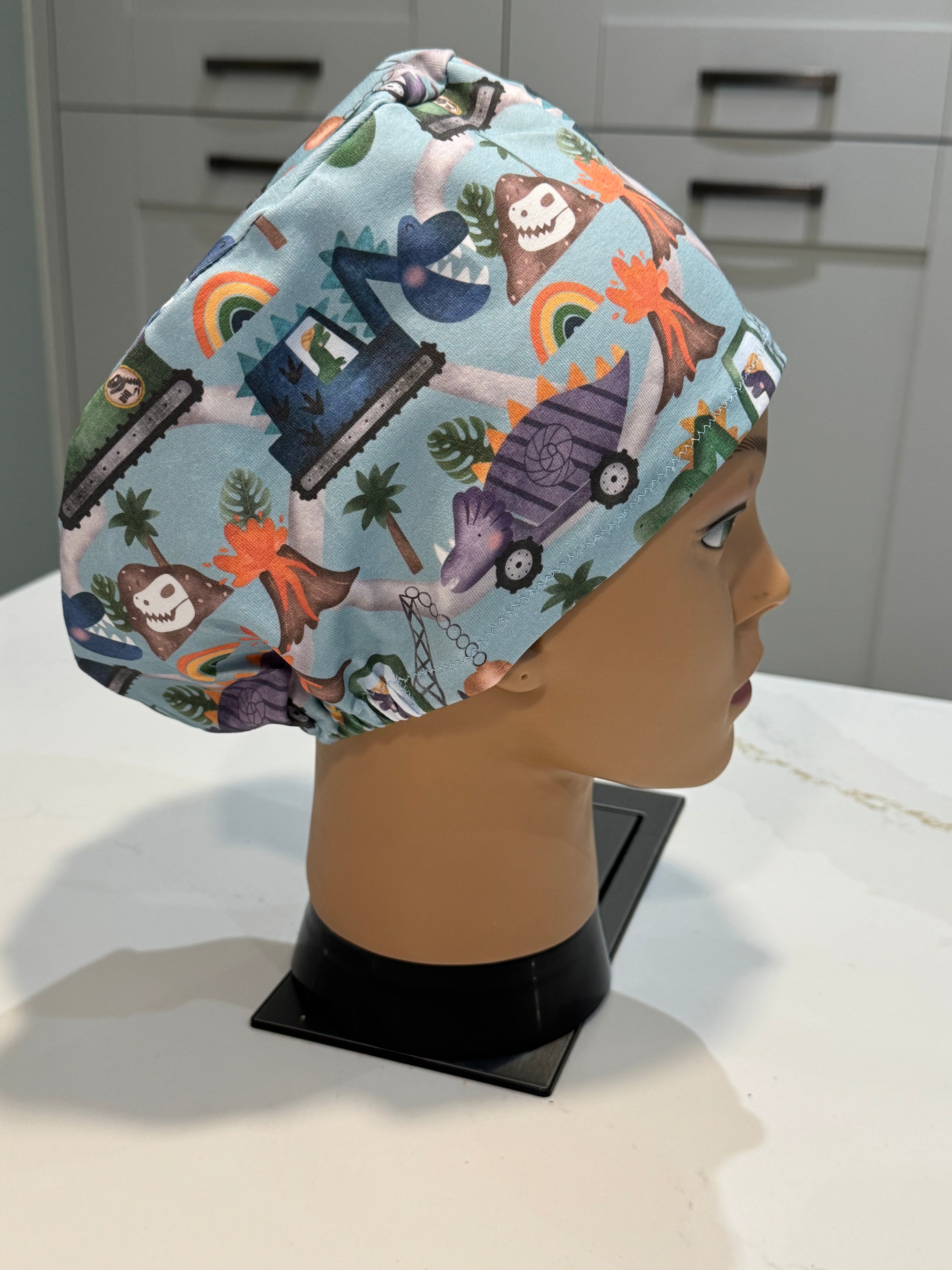 Dino Trucks Premium Jersey super soft and smooth cotton theatre scrub hat/cap.