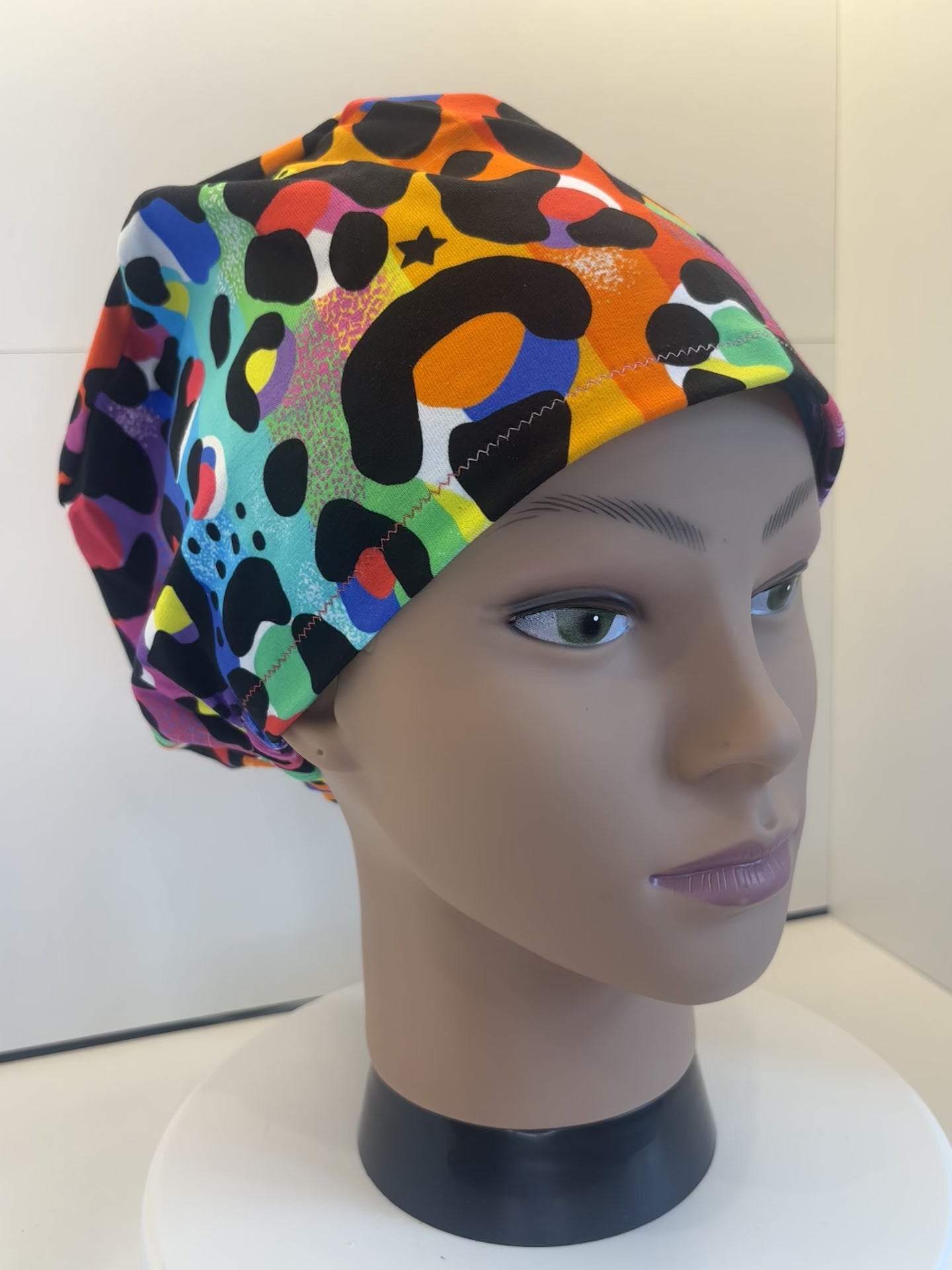 Rainbow Leopard Print Soft Jersey Fabric theatre scrub cap / hat.  Ethically made. Standard and Large size