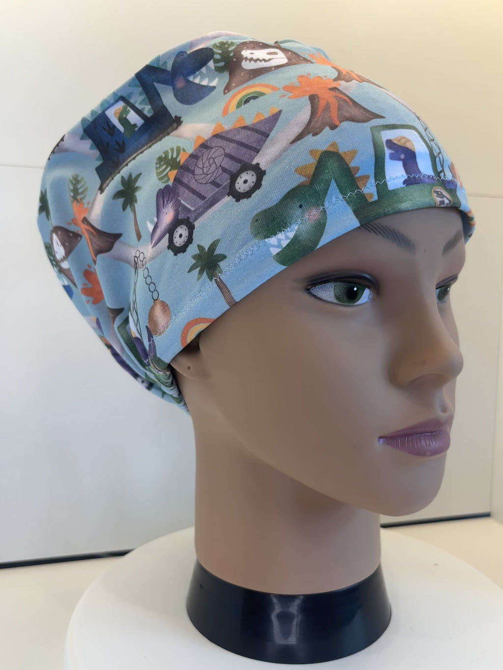 Dino Trucks Premium Jersey super soft and smooth cotton theatre scrub hat/cap.